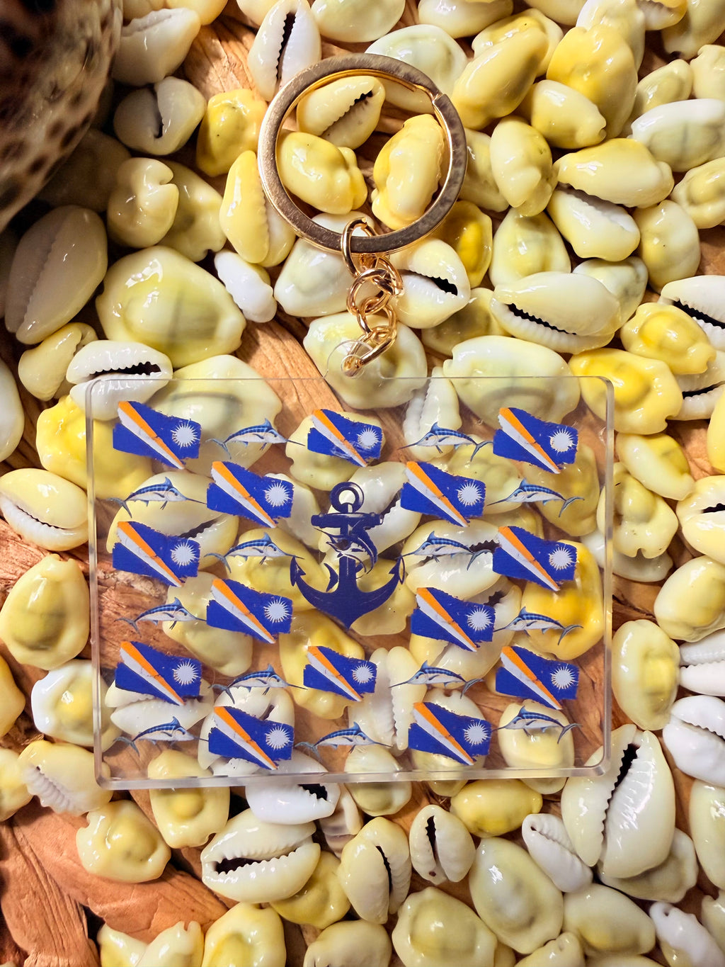Keychain(MarshallIslands flag/Anchor/marlin)Once you set foot on Marshall Islands, you’ll Anchor yourself cause of the Marlins all over our oceanic:)